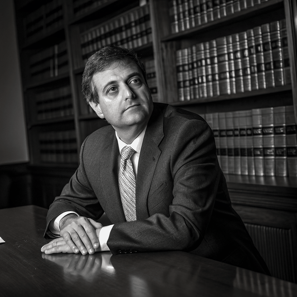 Attorney reviewing legal files in a library